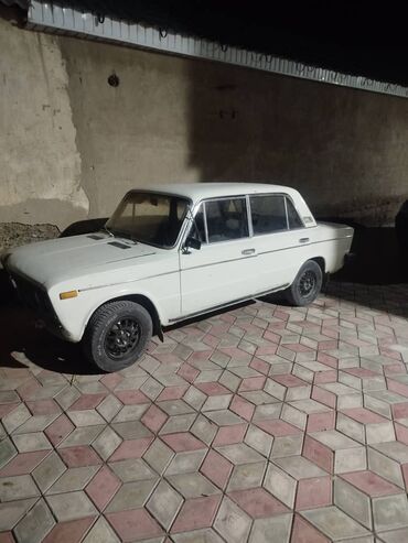 трактор мтз юмз: Автомобиль ВАЗ-2106 белого цвета. Данная модель представляет собой