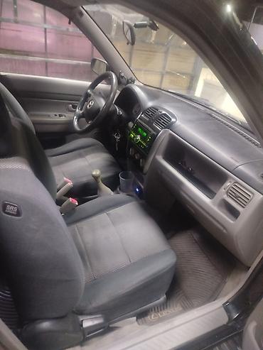 Mazda Demio: 2002 г., 1.5 л, Кол менен иштөөчү, Бензин, Хетчбек — 8