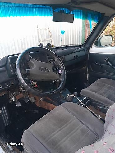 Унаа: ВАЗ (ЛАДА) 4x4 Niva: 2005 г., 1.7 л, Кол менен иштөөчү, Бензин, Жол тандабас — 4