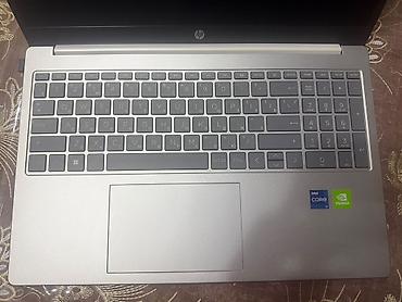 mini notebook: HP noutbuk satılır. Korpus gümüşü rəngdədir, zərif və müasir dizayna — 8