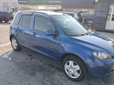 хетчбек: Mazda Demio: 2003 г., 1.3 л, Автомат, Бензин, Хэтчбэк — 2