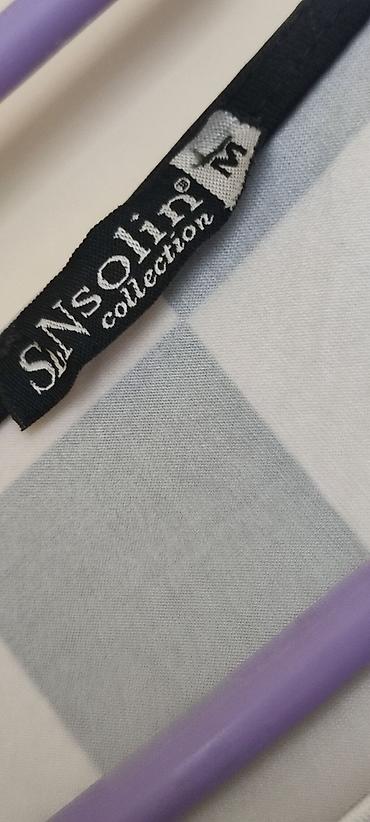 sat parfois: Dve ženske haljine bez rukava. 1) Crno-bela haljina sa talasastim — 7