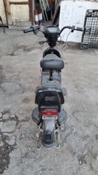 дождевик на скутер: Электроскутер/электромопед городского типа Описание: - Компактный