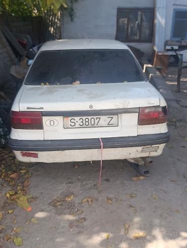 265 40 22: Mitsubishi Lancer: 1989 г., Механика, Седан — 1
