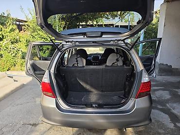 bud e9: Honda Fit: 2004 г., 1.3 л, Вариатор, Бензин, Хэтчбэк — 5