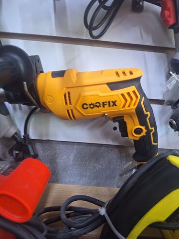 запчасти на дрель: Электрическая дрель-шуруповерт Coofix, выполненная в желтом и черном