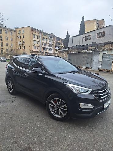 ford focus hatchback: Hyundai Santa Fe: 2 l | 2014 il Krossover — 3