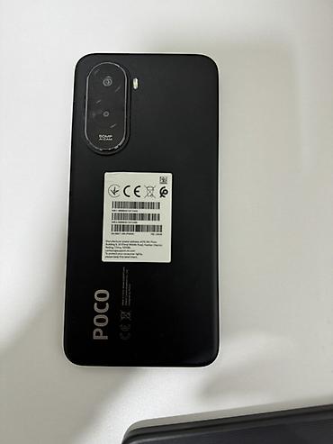 поко 71: Смартфон POCO M7 в черном цвете. На фото видно: - встроенная память — 2