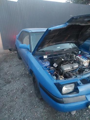 Продажа авто: Mazda 323: 1991 г., 1.6 л, Механика, Бензин, Седан — 8
