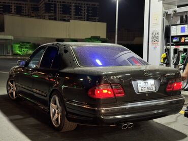 Mercedes-Benz E 55: 5.5 l | 2002 il Sedan