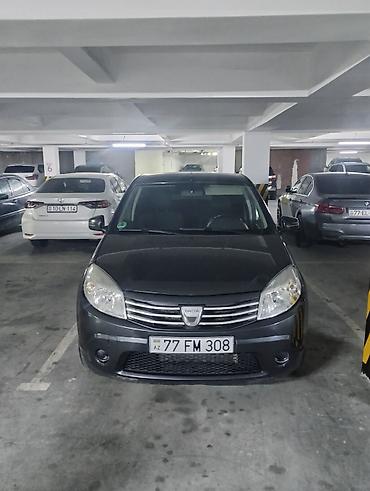Dacia Sandero: 1.4 л | 2009 г. 225000 км Хэтчбэк — 1
