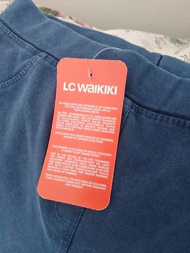 ramaks pantalone: LC Waikiki ženske pantalone – plave, zvoncare - Model: zvonaste — 1