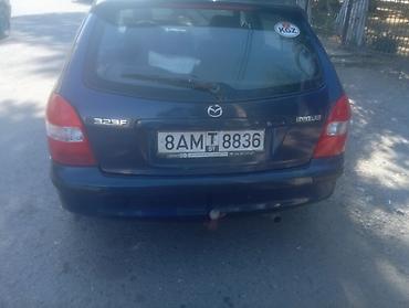аудио касета: Mazda 323: 2000 г., Механика, Бензин — 5