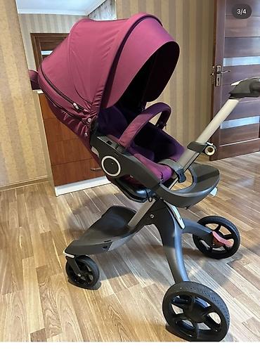 baş ortusu: Uşaq arabası – Stokke Xplory (bənövşəyi rəng) Xüsusiyyətlər: - Yüksək — 1