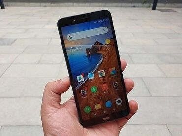 реальному: Xiaomi, Redmi 7A, Б/у, 32 ГБ, цвет - Голубой, 2 SIM