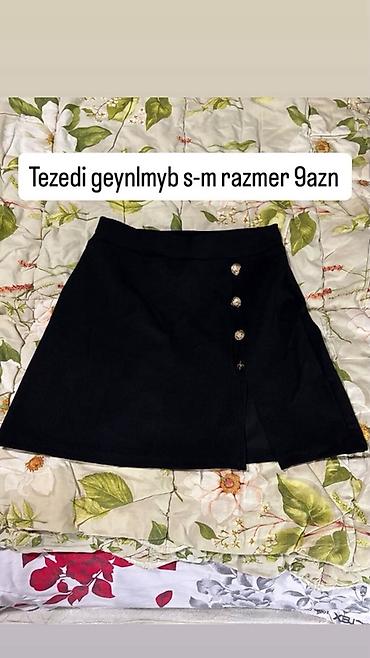 Qadın ətəkləri dəsti 1) Qara mini ətək - Model: Asimmetrik kəsimli