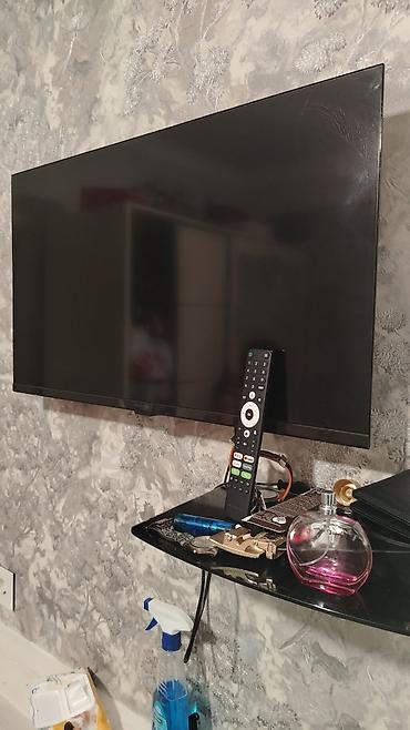 pult qabı: Hoffmann Smart TV – divara asılan, nazik çərçivəli ekran — 3