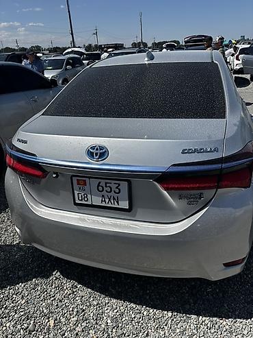 corola: Toyota Corolla: 2019 г., 1.8 л, Вариатор, Гибрид, Седан — 2