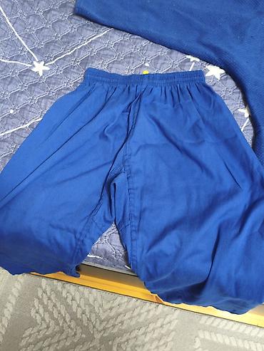 İdman formaları: Məhsul: Adidas mavi cüdo kimono dəsti Tərkib: - Jaket (yuxarı hissə) — 5