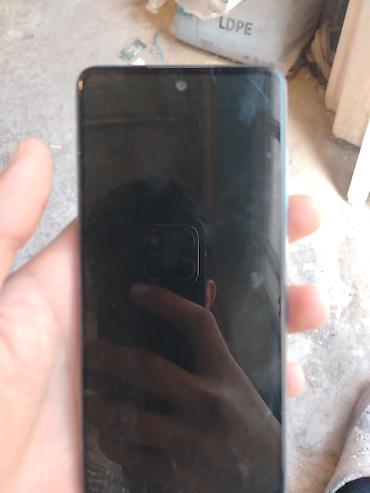 iphone 14 kontakt home: Mavi rəngli smartfon - Yan hissədə fiziki səs tənzimləmə düymələri və — 3
