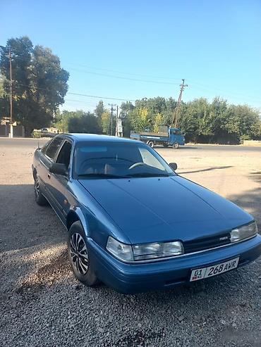 шилем: Mazda 626: 1990 г., Кол менен иштөөчү, Бензин, Седан — 1