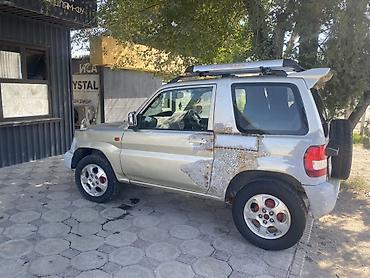 поджеро ио: Mitsubishi Pajero iO: 1999 г., 1.8 л, Автомат, Бензин, Внедорожник — 7