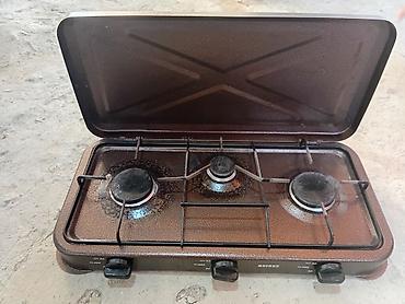 Газовые печи: Üç gözlü portativ qaz plitəsi - Marka/model: üzərində “Güdeks” yazısı — 1