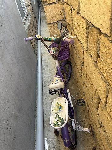 velosiped kreditle: Uşaq velosipedi – bənövşəyi rəngli, sepetli model. Xüsusiyyətlər: - — 1