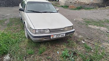 трактор капатил: Mazda 626: 1989 г., 2 л, Механика, Бензин, Лифтбек — 4
