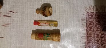 Ətriyyat: Qizil gül yaği ətiri. - ağacdan hazırlanmış minarə formalı qabda. - — 8