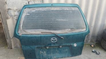 крышка релинга: Крышка багажника Mazda 1997 г., Б/у, цвет - Зеленый,Оригинал