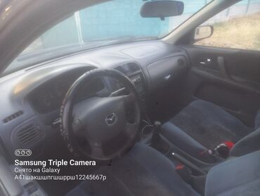 балыкчы автомобиль: Mazda 323: 2000 г., 1.6 л, Механика, Бензин, Седан