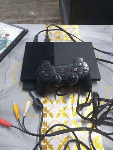 7.1.2 n2g47h: Sony PlayStation 2 Slim (PS2) oyun konsolu Xüsusiyyətlər: - Slim