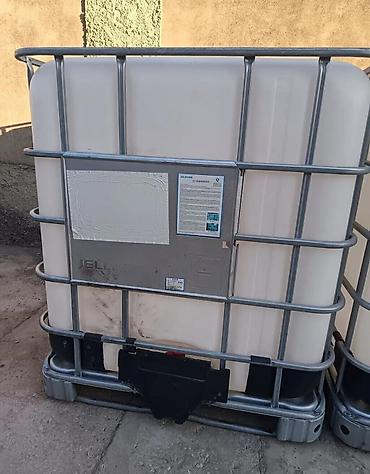 matorlu araba: Su ceni satilir 100azn 1tonluq unvan zire vusqa21000 litrlik IBC — 1