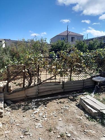 savalanda torpaq: Torpaqda köhnə tikili kürsülü ev var ancaq qiymətə daxil deyil. Torpaq — 4