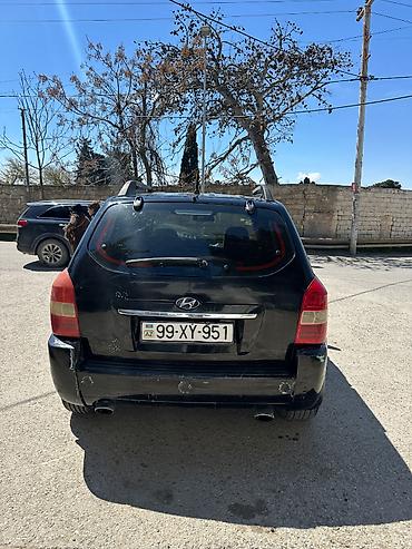 reduktor motor: Hyundai Tucson: 2 l | 2009 il Ofrouder/SUV — 3