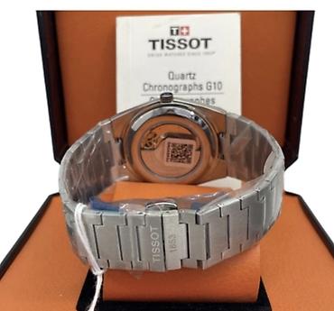 saat romanson: Tissot kişi qol saatı – Swiss Made - Korpus və qolbaq: paslanmayan — 2