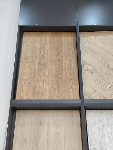 Məhsul: Laminat döşəmə panelləri – ağac teksturalı dekorlar