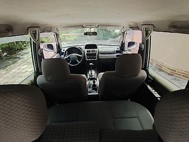 7 nəfərlik avtomobillər: Mitsubishi Pajero: 1.8 l | 1998 il 350000 km Ofrouder/SUV — 7