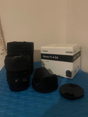 Foto və videokameralar: Ideal veziyetde lens sigma 35mm 1:4 art canon satilir hec bir problemi