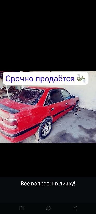 kirgiz auto: Автомобиль седан, красный цвет, 4 двери. Основные особенности: - — 1