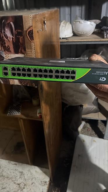 tilgin modem: 24-Port Gigabit PoE Switch - Model qeydində: “24 Gigabit Standard PoE — 1
