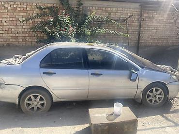 mitsubishi lancer evolution: Mitsubishi Lancer: 2003 г., Седан — 2