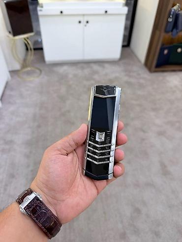 vertu phone: Vertu 4 GB, rəng - Gümüşü, Düyməli — 5
