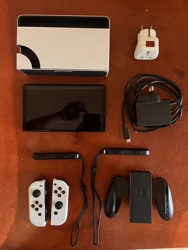 Nintendo Switch: Nintendo Switch OLED (ağ Joy‑Con) oyun konsolu Xüsusiyyətlər: - 7 — 2