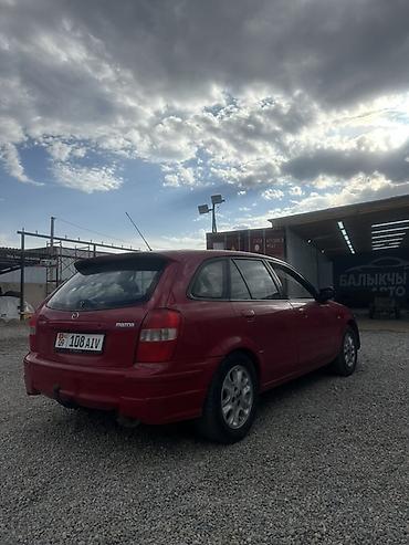 bmw e32: Mazda 323: 1998 г., 1.5 л, Механика, Бензин, Хэтчбэк — 4