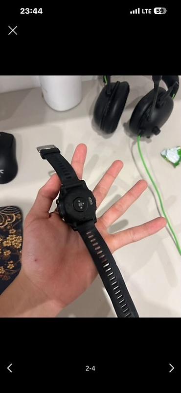Garmin: Спортивные смарт‑часы Garmin (черные) - Круглый дисплей, три боковые — 3