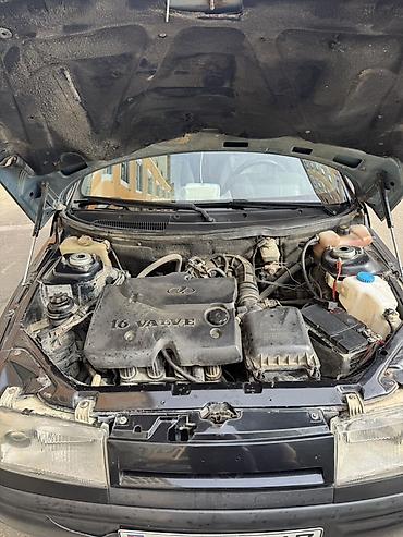 VAZ (LADA): Model: Lada 2112 (hatchback, 5 qapı) Rəng: qara (mat) Yanacaq: benzin — 10