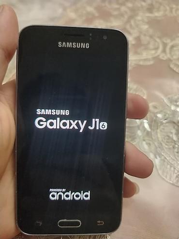 iphone xs max 512 gb: Samsung Galaxy J1 2016, 16 GB, rəng - Qara, İki sim kartlı — 3