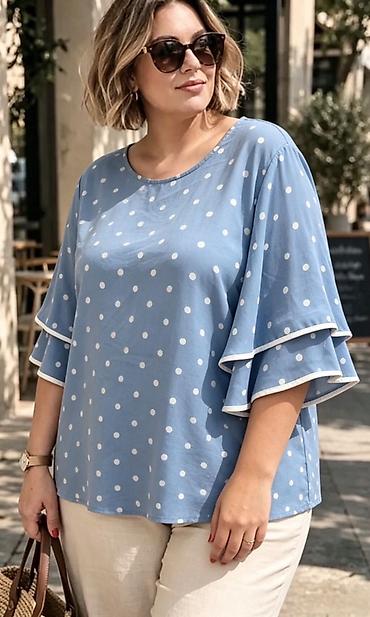 bele bluze: Ženska bluza sa tufnama – model sa karner rukavima
2000
Din
Do xxl — 5